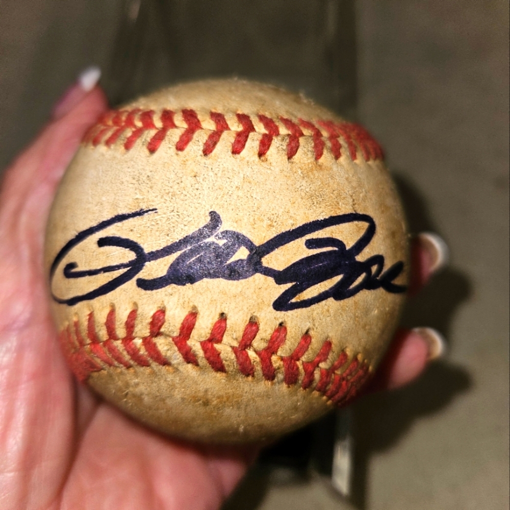 AUTHENTIC PETE ROSE AUTOGRAPHED GAME BALL. IN CASE, NEVER CLEANED.
